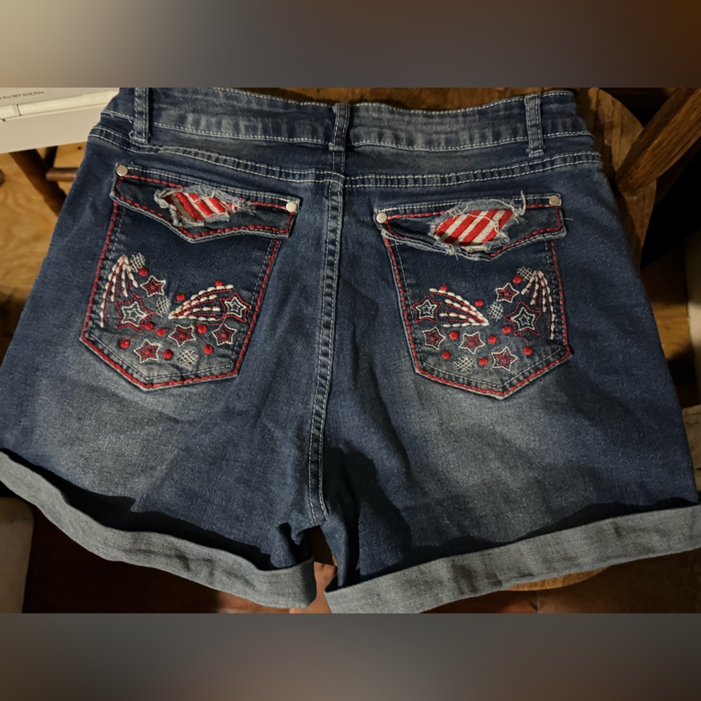 SOLD 
Women’s cute red white and blue Jean shorts
